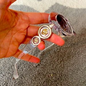Versace sunglasses , clear frame , gold/silver details